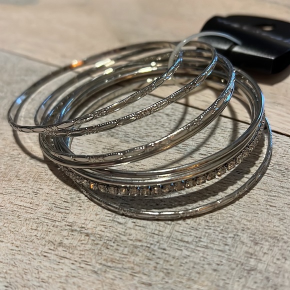 Wet Seal bracelets. NWT. 8 bracelets total. 2.75 in circumference across. - Picture 2 of 3